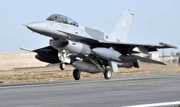 One of six PAF F-16Ds landing at Shahbaz Air Base. The F-16s (C/D and MLU) became pivotal strike and air support assets in Pakistan's COIN campaign. The PAF's F-16s are equipped with Sniper Advanced Targeting Pods (ATP) alongside Paveway LGBs and JDAM PGBs.