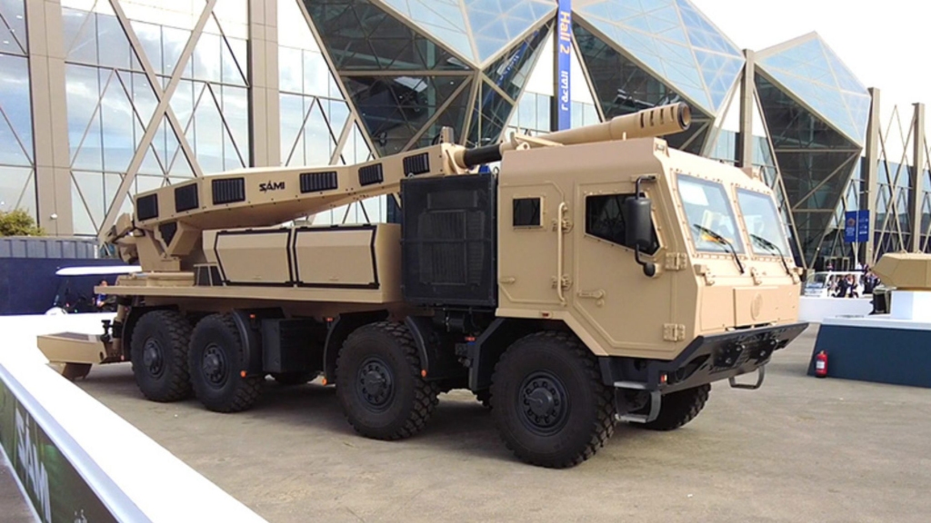 Photo of SAMI's wheeled howitzer. Photo used as a hero image for a news article on Pakistan's Heavy Industries Taxila developing a new howitzer for SAMI.