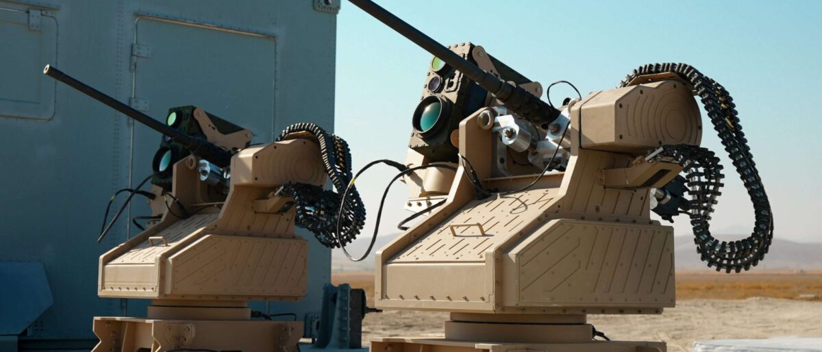 MKE TOLGA counter-drone air-defence concept: mobile radar, electro-optic sensors and a jammer for soft-kill, with 35 mm, 20 mm and 12.7 mm TOLGA gun turrets for hard-kill from 10,000 m to 300 m