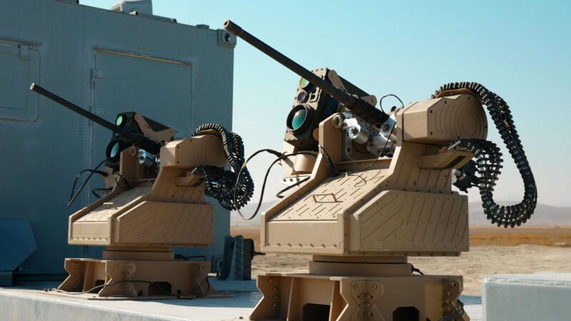MKE TOLGA counter-drone air-defence concept: mobile radar, electro-optic sensors and a jammer for soft-kill, with 35 mm, 20 mm and 12.7 mm TOLGA gun turrets for hard-kill from 10,000 m to 300 m