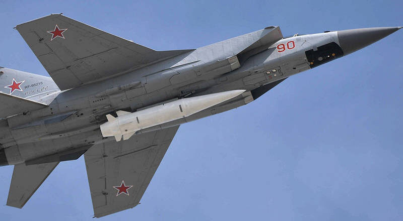 A Kh-47M2 Kinzhal air-launched ballistic missile carried by a Russian MiG-31K interceptor