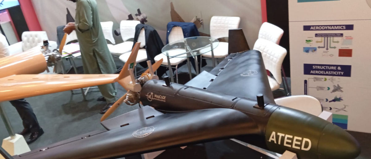 NaqCoDE Technologies Ateed loitering munition on display at Indus RAS Expo 2026 in Pakistan, with the Nasr munition banner behind it