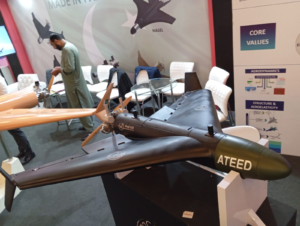 NaqCoDE Technologies Ateed loitering munition on display at Indus RAS Expo 2026 in Pakistan, with the Nasr munition banner behind it