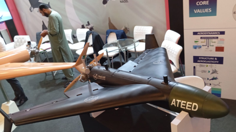 NaqCoDE Technologies Ateed loitering munition on display at Indus RAS Expo 2026 in Pakistan, with the Nasr munition banner behind it