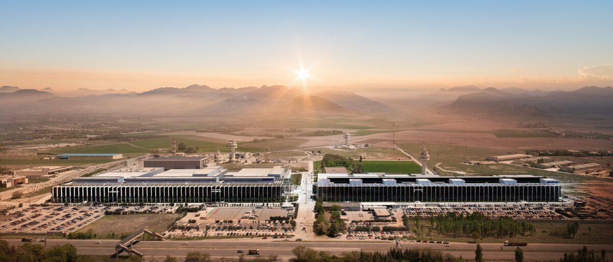 Aerial view of Aselsan's Golbasi technology campus near Ankara at sunrise, showing two production and engineering blocks carrying the Aselsan wordmark