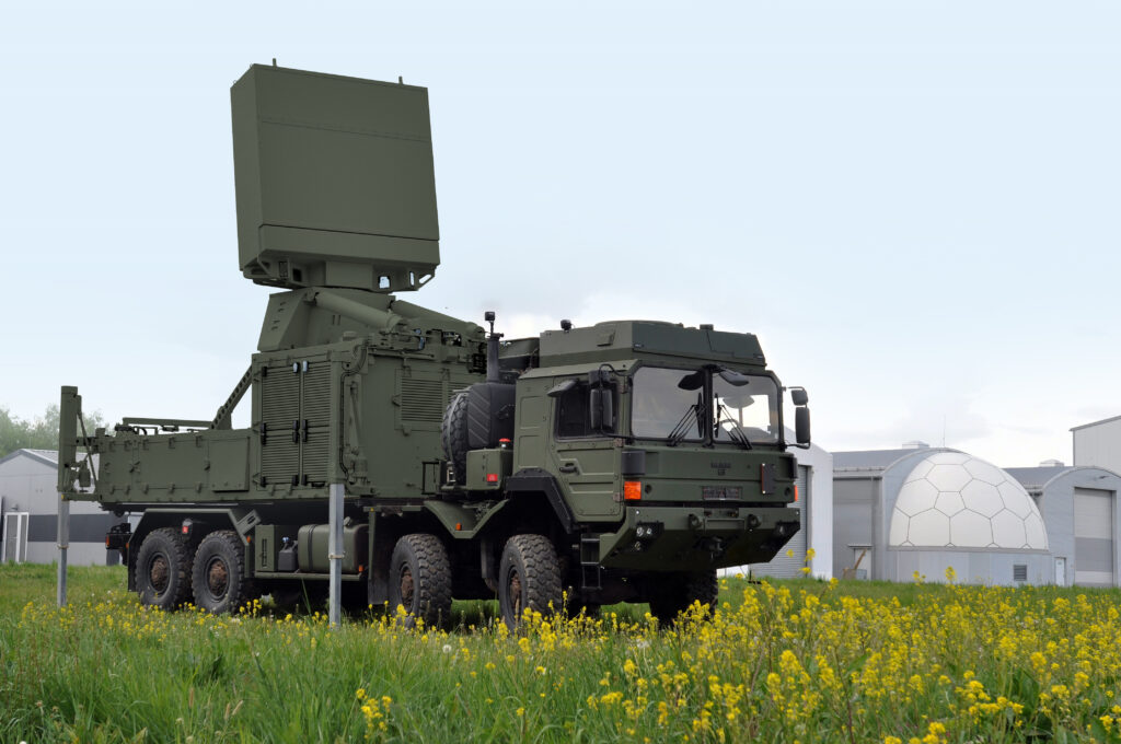 Hensoldt TRML-4D air surveillance and target acquisition radar deployed on a MAN 8x8 truck, a core Sensors division product behind the firm's record order backlog