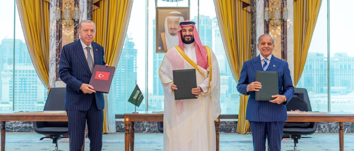 Saudi Crown Prince Mohammed bin Salman, Turkish President Recep Tayyip Erdoğan and Pakistani Prime Minister Muhammad Shehbaz Sharif sign the Makkah Joint Defence Agreement at Al-Safa Palace in Makkah on 07 August 2026.