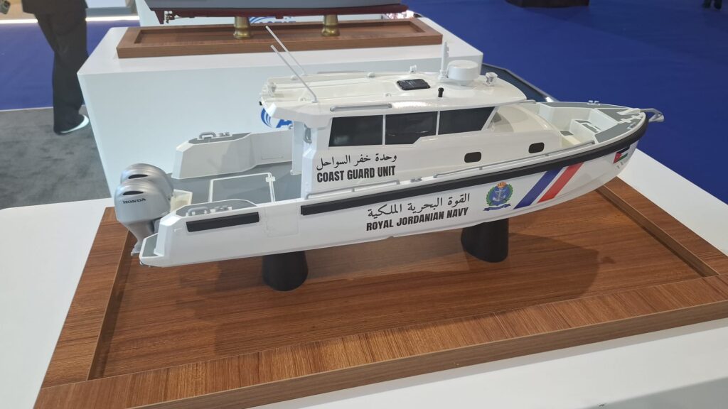 asfat-asbot-royal-jordanian-navy-sofex-2026 - Quwa Scale model of an ASFAT ASBOT patrol boat in Royal Jordanian Navy markings at SOFEX 2026