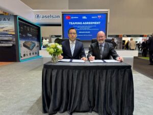 ASELSAN and ECLIPS representatives signing their teaming agreement at Land Forces 2026